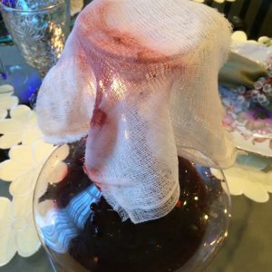 Using Cheesecloth to filter out the crumbled cork