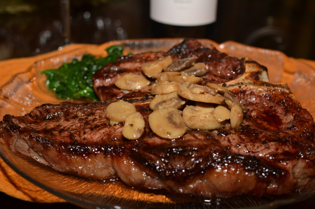 Grilled Porterhouse Steak with Sautéed Mushrooms paired with Merlot